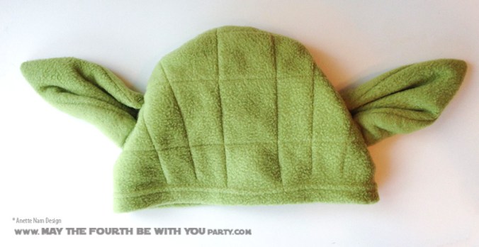 DIY Yoda Fleece hat. Check out all our other Star Wars costumes on our blog! #yoda #starwars #starwarsparty #maythefourthbewithyou #starwarsbirthday #starwarscostume #halloweencostume #cosplay maythefourthbewithyoupartyblog.com