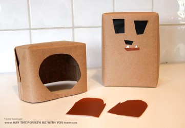 Ewok Wrapping and Paper Crafts (with Bobblehead) /// Check out our blog for lots of Star Wars Party crafts and ideas /// #starwars #starwarsparty #maythefourthbewithyou #starwarsbirthday #ewok #papercraft maythefourthbewithyoupartyblog.com