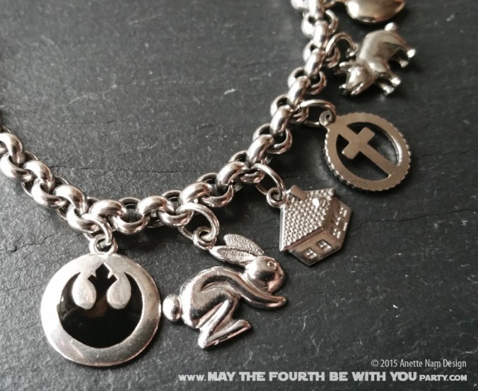 Star Wars Charm Bracelet and Jewelry/// Check out our blog for lots of Star Wars gift ideas /// #starwars #starwarsgift #maythefourthbewithyou #starwarsbirthday #jewelry #christmaspresent #starwarsjewelry #rebels #empire #silver #stainlesssteel #charm #charmbracelet maythefourthbewithyoupartyblog.com