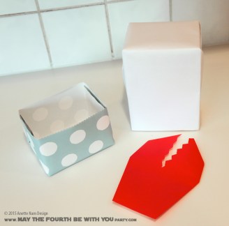 Space Slug Gift Wrapping and Paper Crafts /// Check out our blog for lots of Star Wars Party crafts and ideas /// #starwars #starwarsparty #maythefourthbewithyou #starwarsbirthday #spaceslug #papercraft maythefourthbewithyoupartyblog.com 